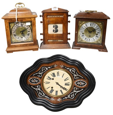 Lot 318 - A Perpetual Desk Calendar, together with a...