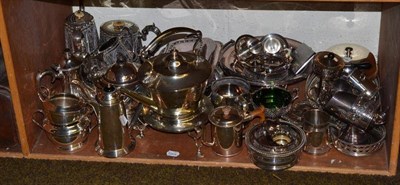 Lot 191 - A shelf of silver plated items including tea services, trays, entree dishes and covers, cake...