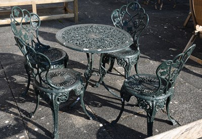 Lot 1214 - A Green Painted Cast Iron Garden Table, with a...