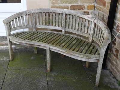 Lot 1233 - A Curved Slatted Wooden Garden Bench, 157cm
