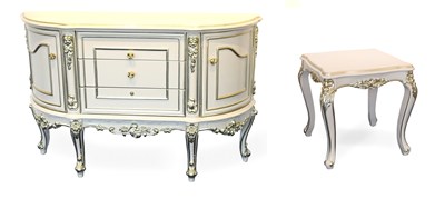 Lot 1382 - A Cream and Parcel-Gilt Sideboard, with three...