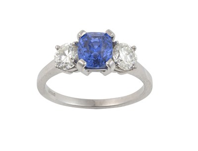 Lot 2302 - A Sapphire and Diamond Three Stone Ring the...