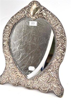 Lot 223 - A silver mounted mirror