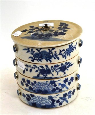 Lot 228 - Chinese blue and white four tier porcelain food box and cover, Qing dynasty, 19th century