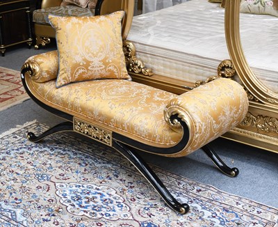 Lot 1416 - An Ebonized and Parcel Gilt Window Seat, of...