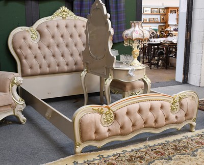 Lot 1409 - A Painted and Parcel Gilt King Size Bed, with...