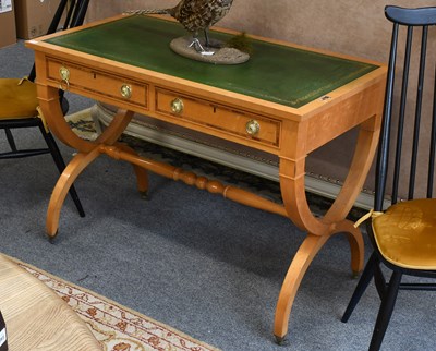 Lot 1346 - A Crossbanded Maple Library Table, with green...