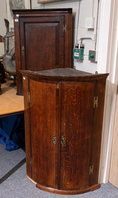 Lot 1486 - A Late 19th Century Bow Fronted Oak Hanging...