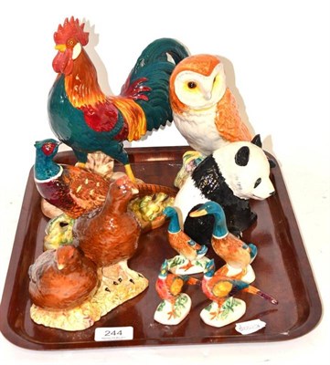 Lot 244 - A tray of Beswick including grouse, pheasant, a leg horn cockerel, owl, panda and ducks