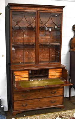 Lot 1163 - A George III Mahogany Secretaire Bookcase,...