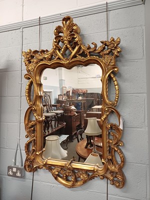 Lot 1178 - A Reproduction Gilt-Framed Wall Mirror, with...