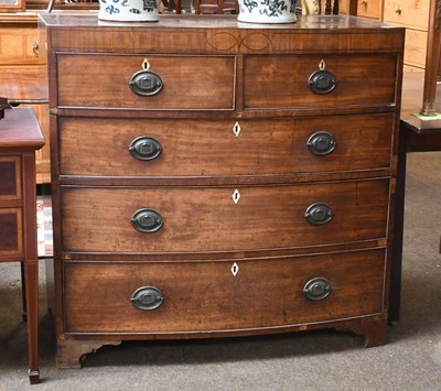 Lot 1254 - A Regency Mahogany Bow-Front Four-Height Chest...