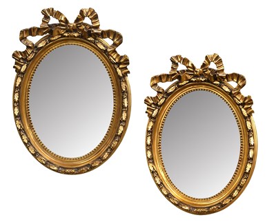 Lot 1286 - A Pair of Reproduction Gilt Framed Oval Wall...