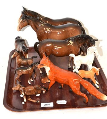 Lot 254 - A tray of Beswick including horses and foals and a fox