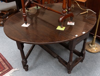 Lot 1385 - An 18th Century Oak Gate Leg Dining Table,...