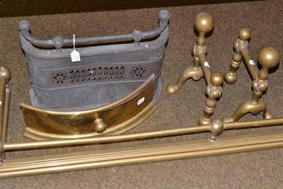 Lot 268 - A brass rail fender, pair of brass andirons and two small grate fronts