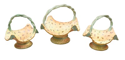 Lot 190 - A Garniture of Three Royal Worcester Porcelain...