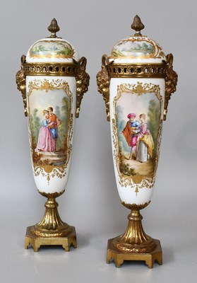 Lot 27 - A Pair of Sèvres Style Vases and Covers, with...