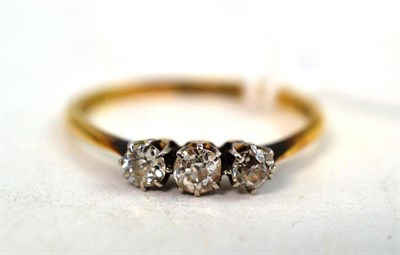 Lot 289 - A diamond three stone ring, circa 1930