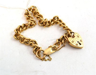 Lot 293 - A 9ct gold curb and lock bracelet