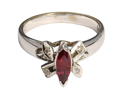 Lot 347 - A Red Stone and Diamond Ring, the marquise cut...
