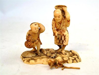 Lot 297 - Walrus ivory carved group