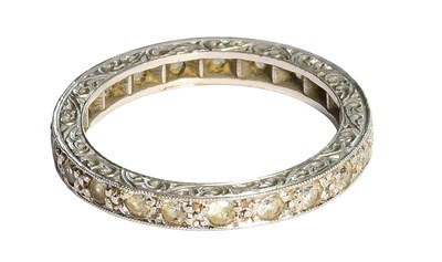 Lot 315 - A Synthetic White Spinel Ring, the round cut...