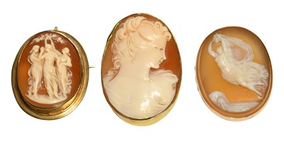 Lot 332 - A Shell Cameo Brooch, depicting the three...