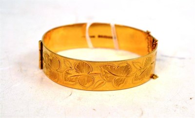 Lot 305 - A 9ct gold bangle