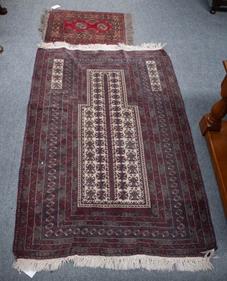 Lot 1315 - Baluch Prayer Rug, the ivory field of tree of...