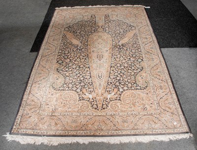 Lot 1312 - Indian Prayer Rug, the charcoal field of...