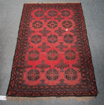 Lot 1316 - Afghan Rug, the field with an allover design...