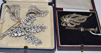 Lot 310 - A diamond set bar brooch, a marcasite brooch and paste set brooches