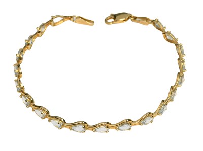 Lot 353 - A 14 Carat Gold Aquamarine Bracelet, twenty...
