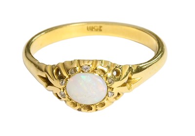Lot 318 - An Opal and Diamond Cluster Ring, an oval...