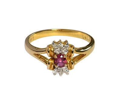 Lot 335 - A Red Stone and Diamond Cluster Ring, an oval...