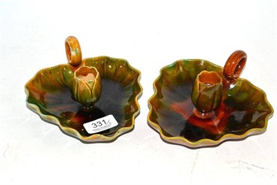 Lot 331 - Pair of Linthorpe pottery Lily Pad chamber candlesticks, green/mustard glaze, impressed...