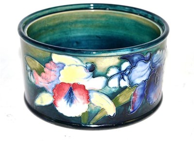 Lot 335 - Walter Moorcroft 'Orchid and Spring Flowers' jar (lacking cover)