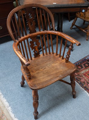 Lot 1394 - A 19th Century Yew Wood Windsor Chair