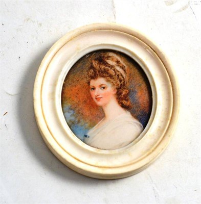 Lot 343 - A 19th century miniature portrait of a lady in an ivory frame