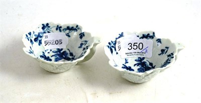 Lot 350 - A pair of early Worcester blue and white porcelain leaf shaped butter boats