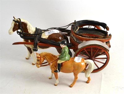 Lot 351 - A Beswick child on a pony and a Beswick horse and trap