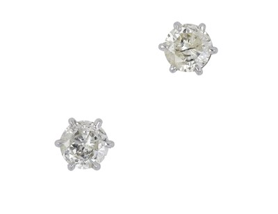 Lot 2232 - A Pair of 18 Carat Gold Diamond Solitaire...