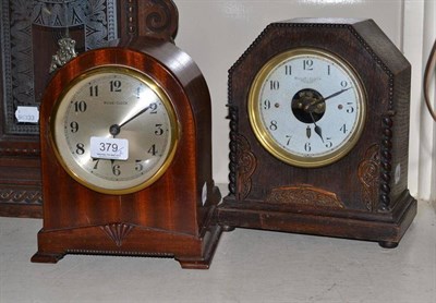 Lot 379 - Two boulle electric clocks