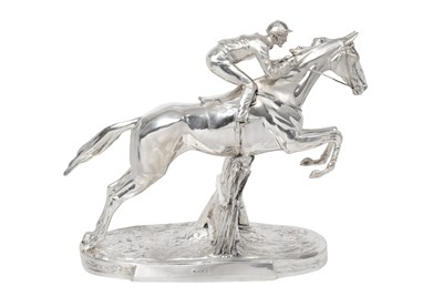 Lot 2183 - An Elizabeth II Silver Covered Model of a Horse and Jockey