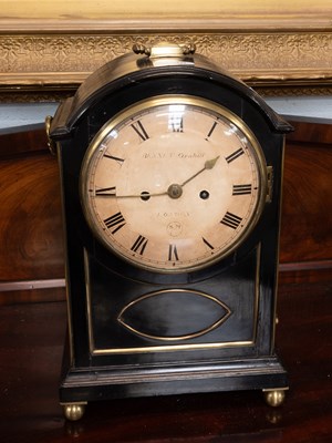 Lot 1345 - An Ebonised Striking Table Clock, retailed by...