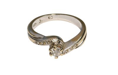 Lot 368A - A Cubic Zirconia Twist Ring, stamped '750',...