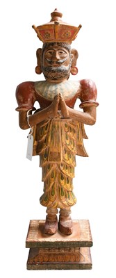 Lot 200 - An Indian Carved and Polychrome Wood Figure,...