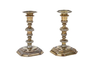 Lot 2001 - A Pair of William III Silver-Gilt Candlesticks