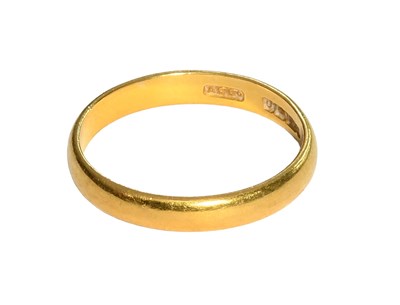 Lot 313 - A 22 Carat Gold Band Ring, finger size M1/2